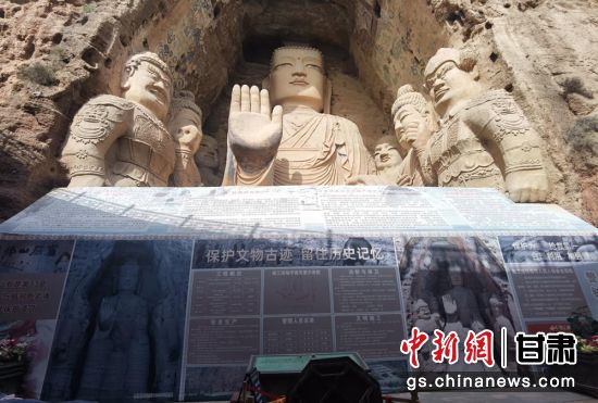 時下，中國“石窟鼻祖”天梯山石窟第13窟大佛足部與局部危巖體搶救性保護項目正在施工。圖為施工現(xiàn)場。陳曉斌 攝