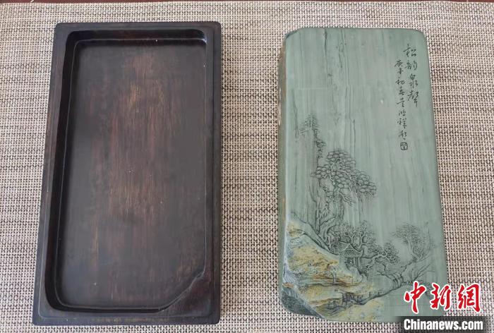 圖為盧保勝為提升洮硯文化內(nèi)涵，制作“一硯一銘、一盒一拓”成品展示?！堟?攝